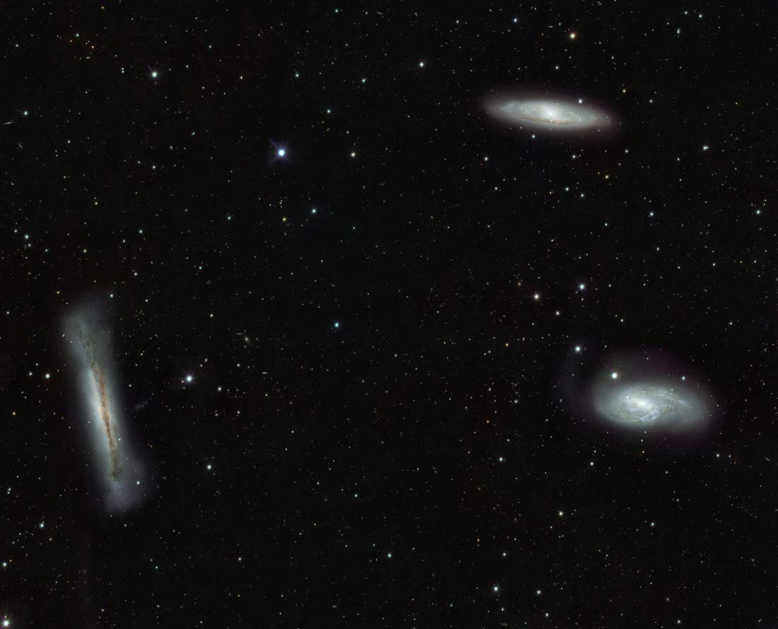 Galaxy Triplets Pose for Cosmic Family Portrait